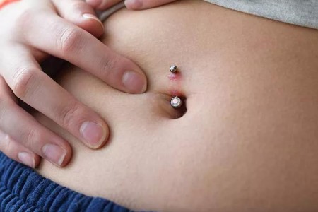 How To Treat an Infected Belly Button Piercing