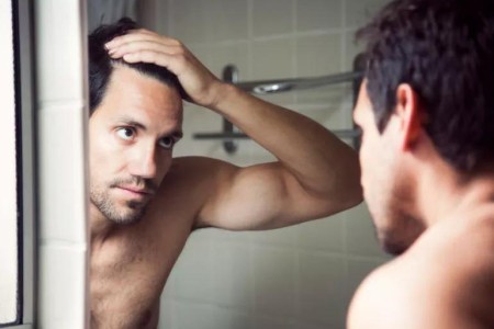Can Your Hair Protect Your Scalp From Skin Cancer?