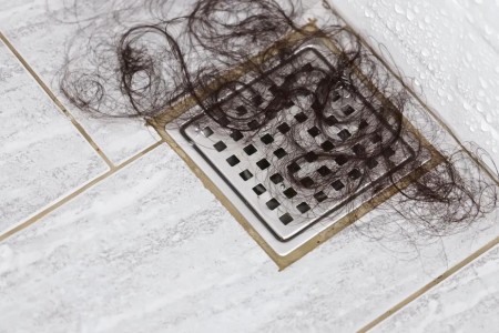 Here’s Why Your Hair Falls Out in the Shower