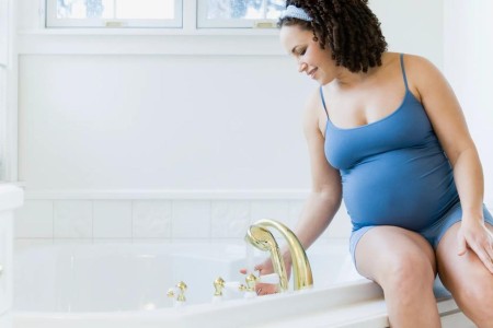 What To Know About Taking a Bath While Pregnant